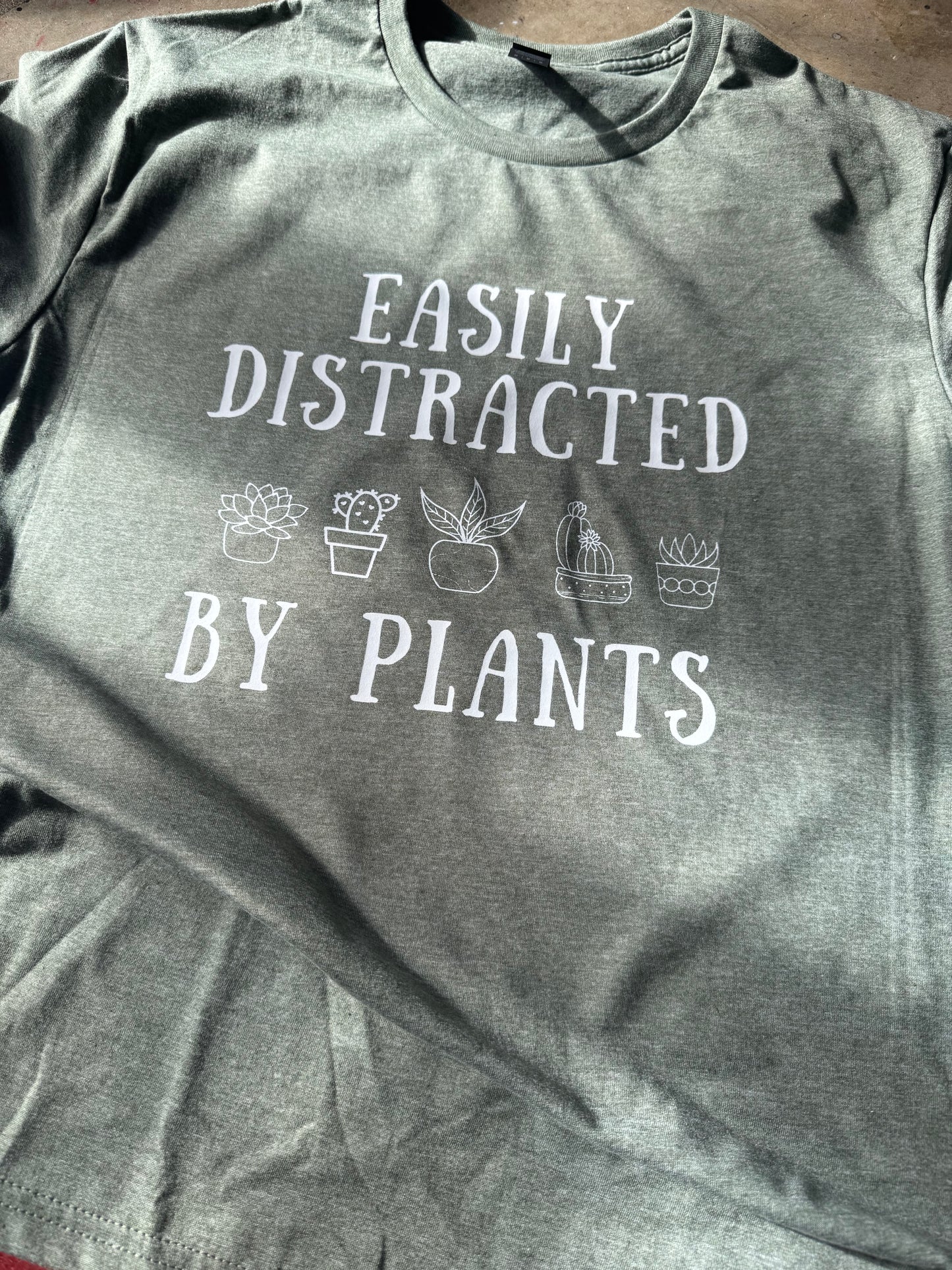 Easily distracted by plants graphic design